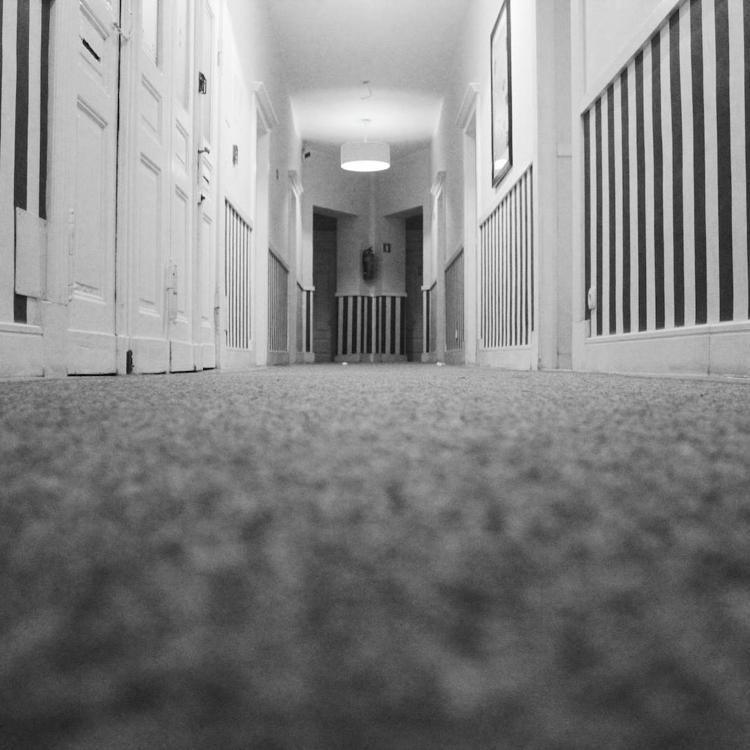 Low Angle Photo of Hallway Inside Closed Room